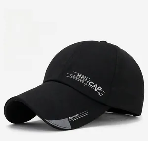 Side view of black canvas sports cap with extra-long brim and white letter embroidery