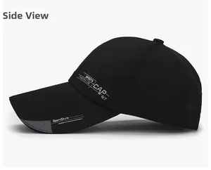 Side view of black canvas baseball cap featuring white sports typography and a long brim