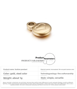Detailed macro view of 18K gold and stainless steel heart charms with size specifications