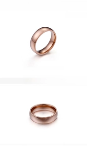 Detailed view of a 6mm rose gold stainless steel ring with polished finish and dimensions