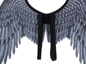 Detail view of black feather wings with elastic straps for Halloween costume use