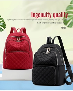 Waterproof quilted nylon backpacks in red and black colors with diamond stitch pattern