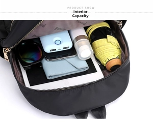 Top view showing spacious main compartment with multi-pocket lining for nylon backpack