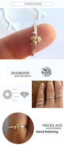 Detail of bee ring showing selected zircon stone and hand polishing craftsmanship