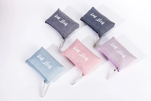 Portable canvas zipper pouch coin purse makeup bag with English letter print, multi-color.