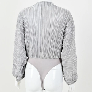 Detail view of grey long sleeve pleated bodysuit featuring a thong back design on mannequin