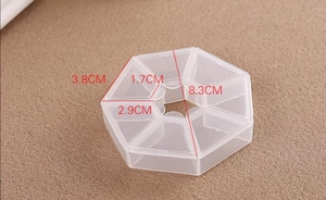 Top view of 7-compartment round pill box showing precise dimensions of 8.3cm diameter
