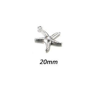 Detail of 20mm hollow starfish pendant in silver finish with dotted surface texture