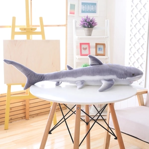 Cute long shark plush pillow made of soft grey and white fabric for home comfort