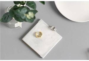 Minimalist double layer S925 silver rings in gold and silver finish on marble tray