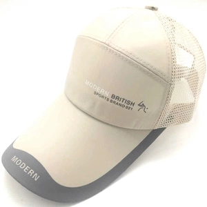 Close-up of mesh fabric on beige baseball cap with Modern British Sports Brano print