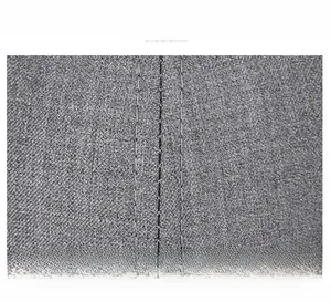 Close-up of high-quality grey textile baseball cap showing detailed double-stitch sewing