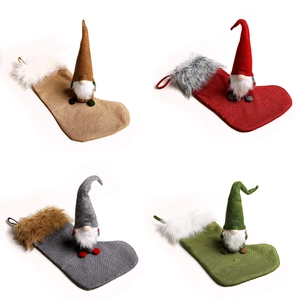 Christmas gnome stocking set with plush gnome toppers in red green brown and grey linen