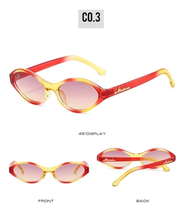 Detail view of retro cat eye sunglasses with red-yellow gradient frames and logo