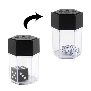 Magic trick set showing a large black die transforming into multiple small white dice