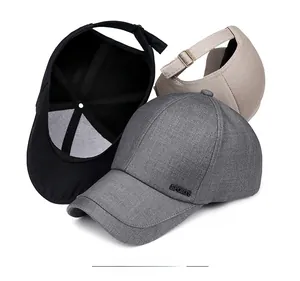 Detailed view of adjustable cotton baseball caps in grey, black, and beige with metal sports tag