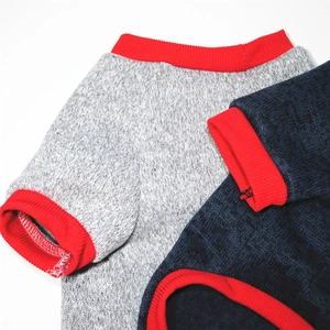 Detail of fleece pet hoodies with contrast ribbed collars and warm knitted fabric textures