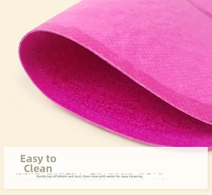 Macro shot of pink PVC coil cat litter mat showing its flexible and washable fiber texture