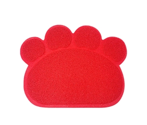 Close-up of the red paw-shaped PVC silk loop litter mat showing the non-slip texture