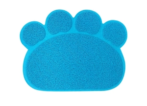 Close-up of blue cat paw shaped PVC coil mat showing anti-slip texture and design