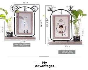 Detail of Nordic iron photo frame with polar bear and deer designs with hydroponic tubes