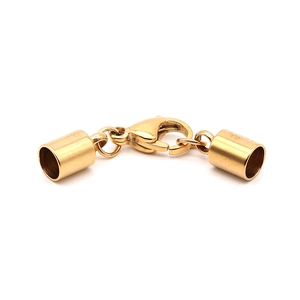 Close-up of golden stainless steel lobster clasp and end caps for DIY jewelry making