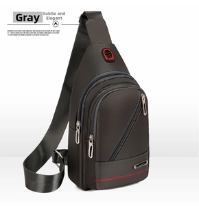 Detail view of water-resistant oxford fabric chest bag with three zipper compartments
