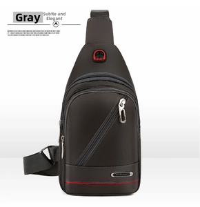 Detail view of grey oxford fabric chest bag featuring headphone port and zip pocket