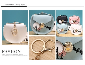 Detail of PU leather mini coin pouch with leaf embroidery and metal swivel lock clasp