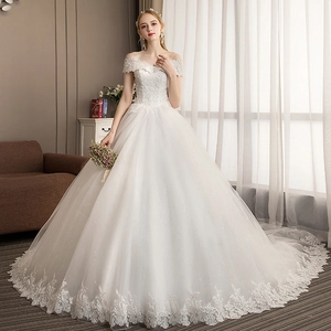 Elegant off-shoulder white lace wedding dress with ball gown tulle skirt and floral embroidery