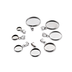 Stainless steel pendant trays in various sizes arranged in a circular minimalist layout