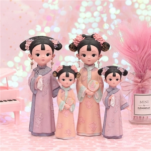 Set of four vintage Qing Dynasty girl figurines in lavender and pink floral robes