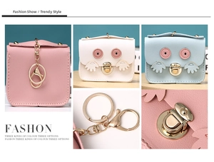 Detail of cute owl coin purse featuring metal twist locks and vibrant PU leather colors