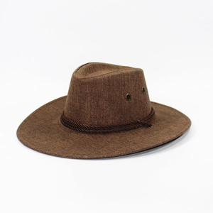 Close-up of brown linen cowboy hat featuring woven texture and metallic eyelets