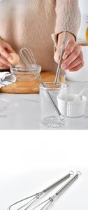 Macro shot of 2-piece mini stainless steel whisk set with spring coil handle for kitchen use