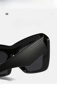 Close-up of cat-eye sunglasses hinge showing premium glossy material and flexible frame