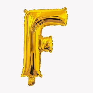 Detailed close-up of golden letter F foil balloon for birthday and wedding decorations