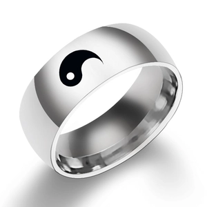 Vintage silver stainless steel Yin Yang Tai Chi ring for men and women on white background