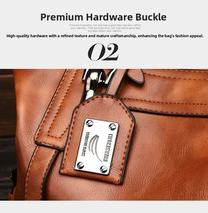 Macro view of brown lychee texture leather bag with silver metal tag detail