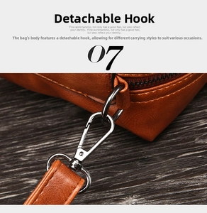 Macro detail of brown pebble leather bag with silver metal hook and adjustable strap