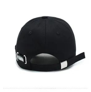 Rear view of black baseball cap with adjustable metal buckle and white embroidery detail