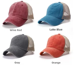 Detail view of retro washed cotton trucker hats in wine red, blue, grey, and orange