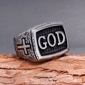 Retro stainless steel men's ring with GOD text and cross engraving on wooden base