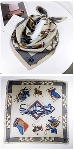 Detailed equestrian print silk scarf with champagne gold accents and horse motifs