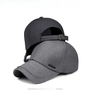 Detail of sports baseball cap showing high-quality fabric and adjustable metal buckle