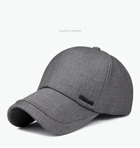 Detailed view of dark grey baseball cap featuring 3D embossed SPORTS logo on fabric