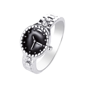 Creative watch-shaped silver ring with black dial and rhinestones on white background