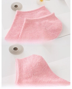 Detail of pink cotton ankle sock with reinforced heel and elastic cuff construction