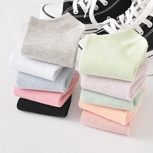 Colorful cotton ankle socks for women in various solid candy colors for casual wear