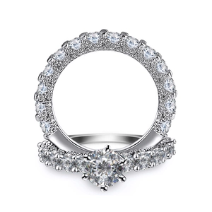 Sparkling silver-tone bridal set with round-cut solitaire and pavé eternity bands